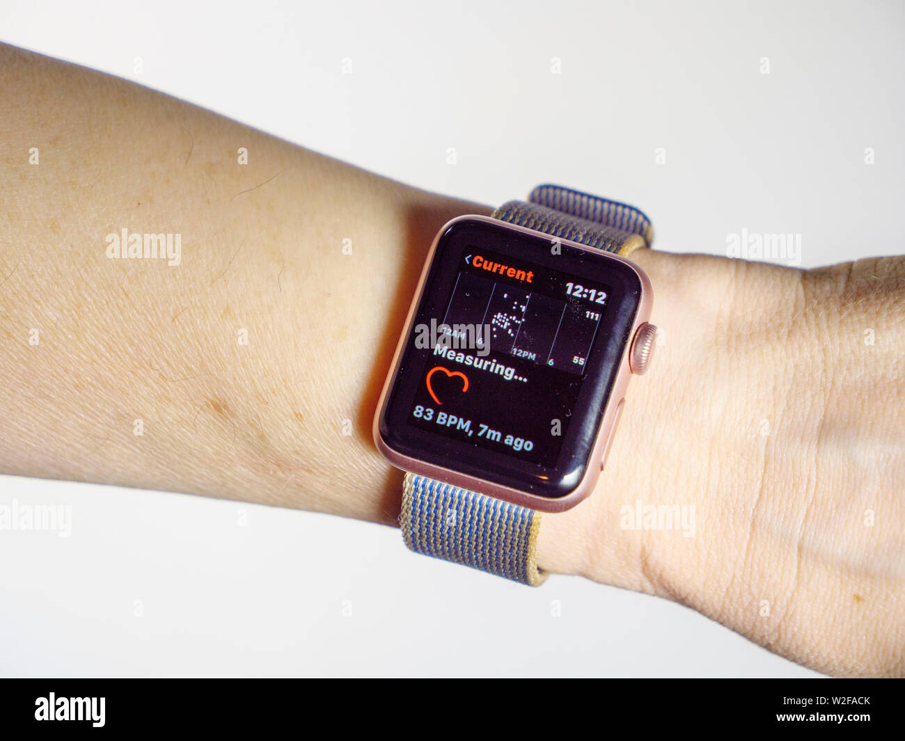 Apple Watch measuring heartbeat. Stock Photo