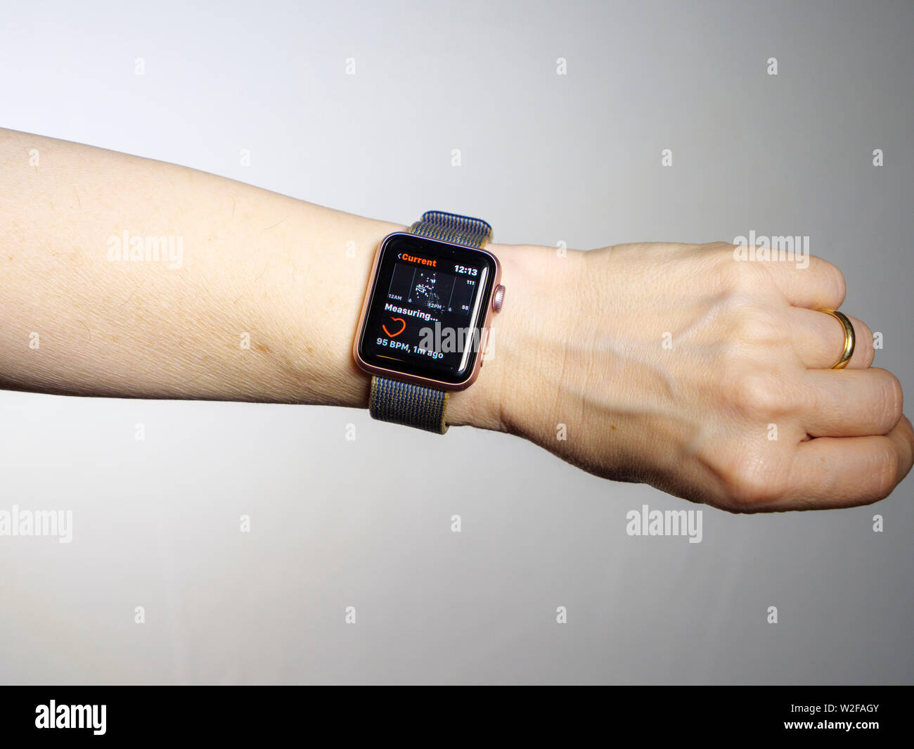 Apple Watch measuring heartbeat. Stock Photo