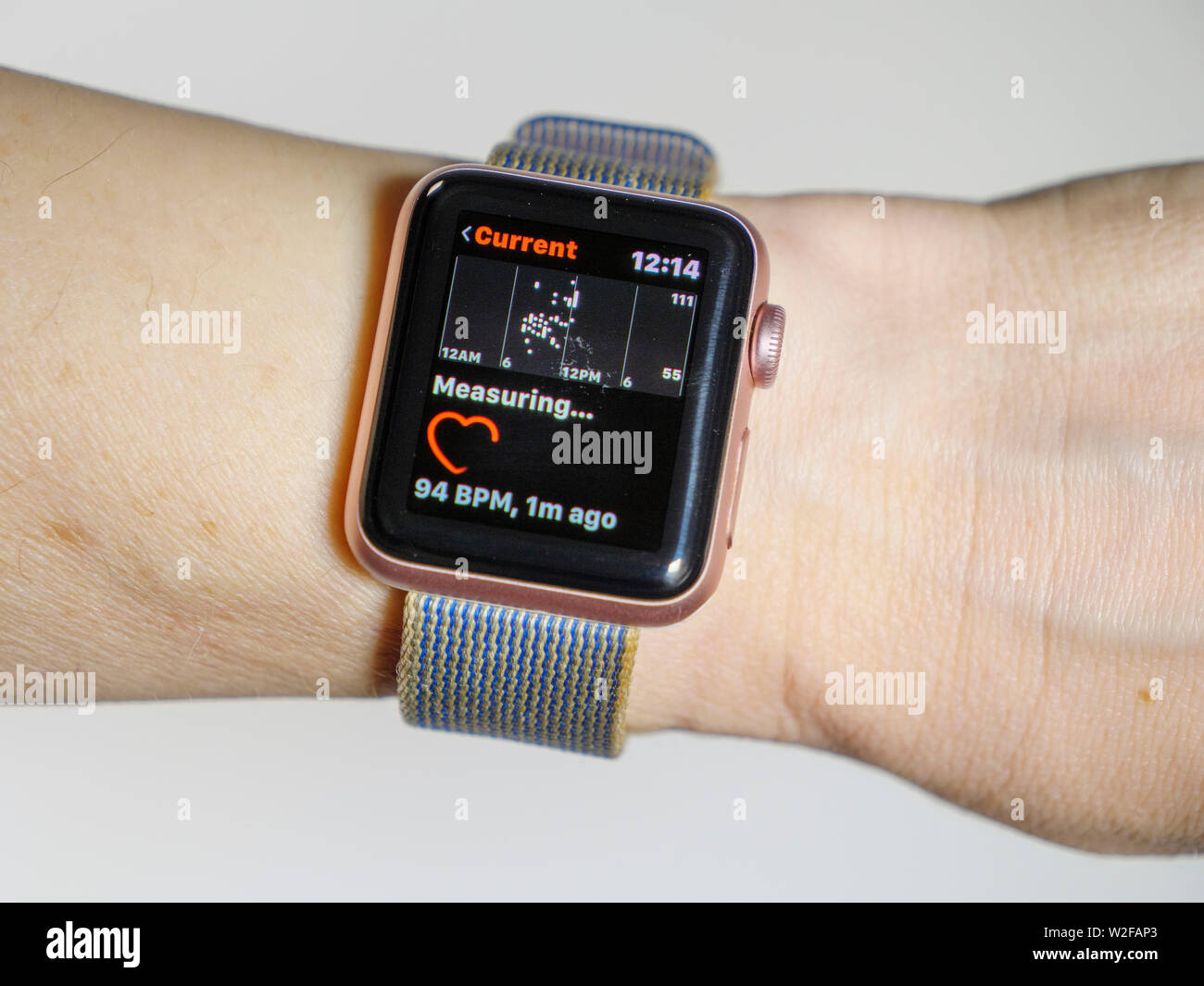 Apple Watch measuring heartbeat. Stock Photo