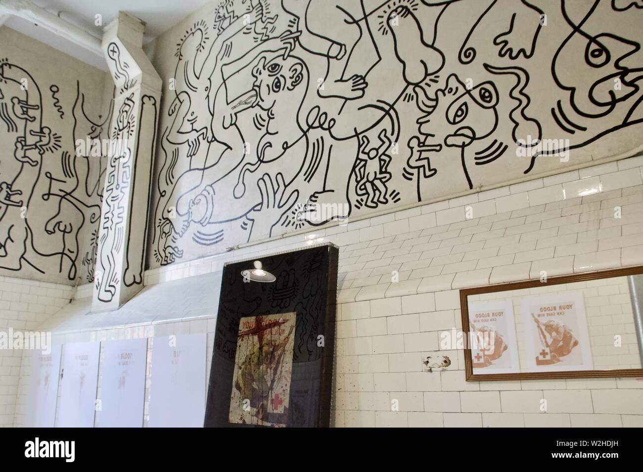 Once upon a time bathroom mural by Keith Haring at the LGBT Community Center in Manhattan, New York Stock Photo