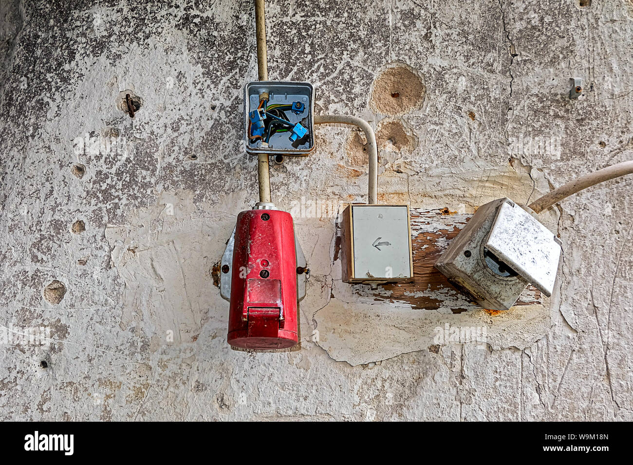 broken ailing sockets high voltage Stock Photo