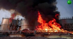 Fire at an oil depot. Picture made in Photoshop by the "Caucasian Knot"