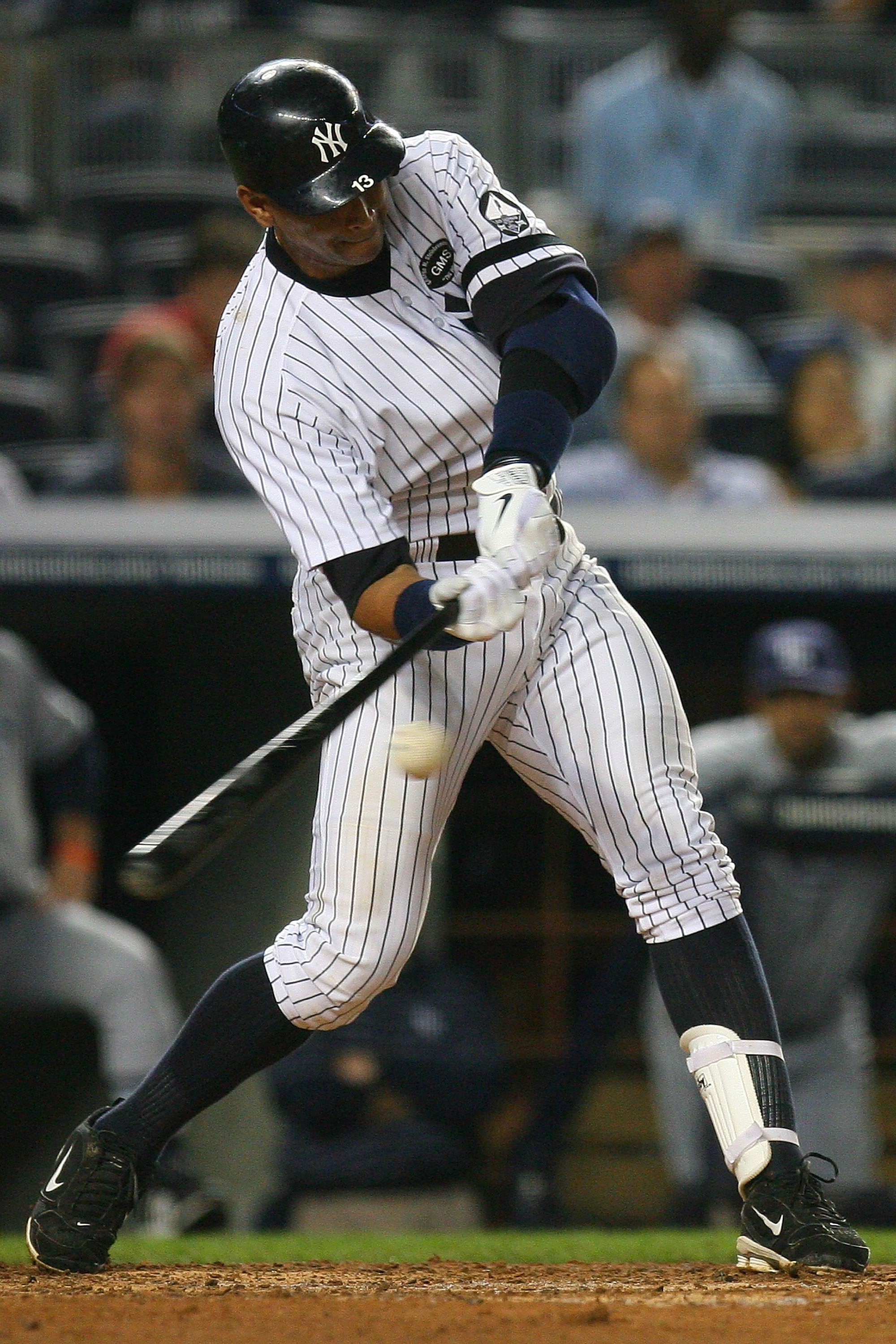 NEW YORK - SEPTEMBER 22:  Alex Rodriguez #13 of the New York Yankees bats against the Tampa Bay Rays on September 22, 2010 at Yankee Stadium in the Bronx borough of New York City.  (Photo by Andrew Burton/Getty Images)