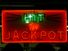 Casino. Gambling. Slots. Slot machine. Luck. Rich. Neon. Hit the Jackpot neon sign lights up casino window.