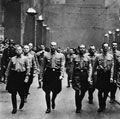 Adolf Hitler participating in a Nazi parade in Munich, Germany, circa 1930s.