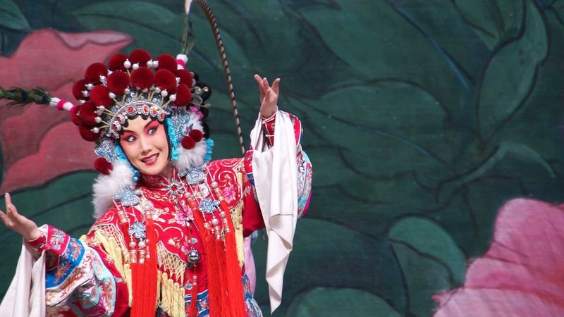 Watch a dancer perform jingxi