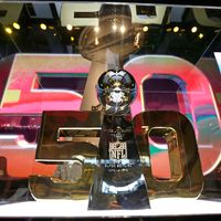 The Vince Lombardi Trophy is displayed inside the NFL Experience Tuesday, Feb. 2, 2016, in San Francisco. The Denver Broncos will play the Carolina Panthers in Super Bowl 50 Sunday, Feb. 7, 2016.