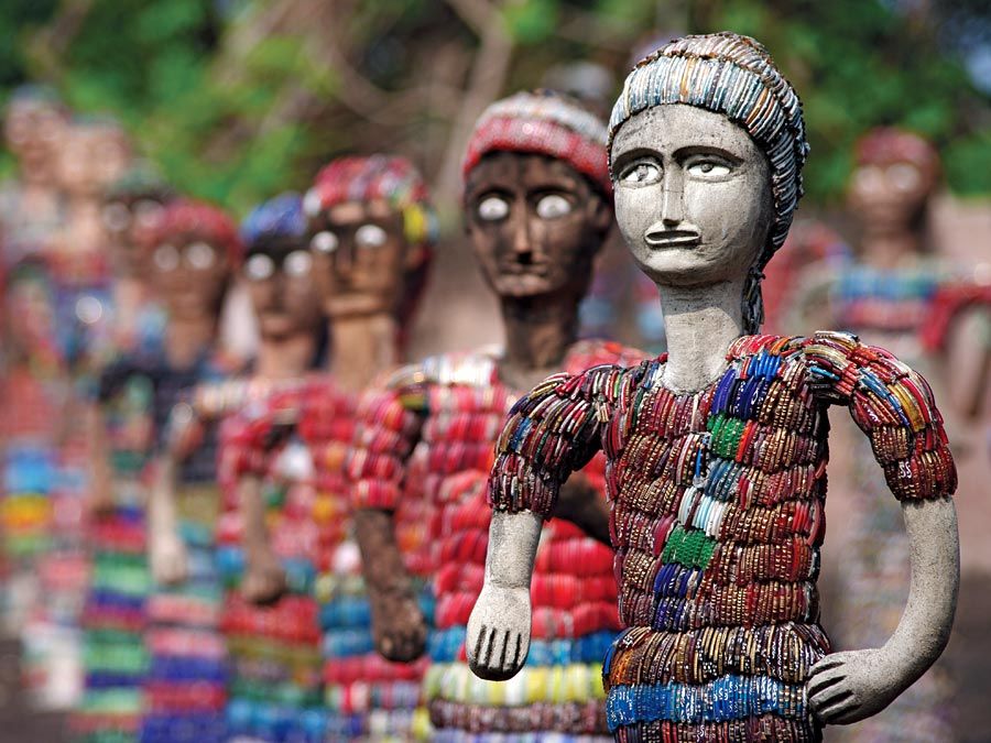 Chandigarh. Statuettes at the Rock Garden of Chandigarh a sculpture park in Chandigarh, India, also known as Nek Chand's Rock Garden. Created by Nek Chand Saini an Indian self taught artist. visionary artist, folk artist, environmental art