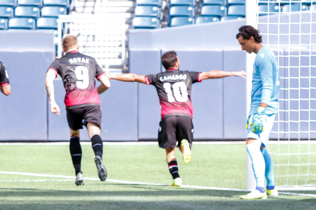 Cavalry's Sergio Camargo celebrates his first-half goal against York United FC. (Photo: Canadian Premier League / Robert Reyes/William Ludwick)