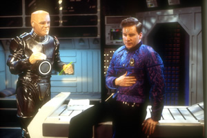 Red Dwarf. Image shows from L to R: Kryten (Robert Llewellyn), Rimmer (Chris Barrie). Copyright: BBC