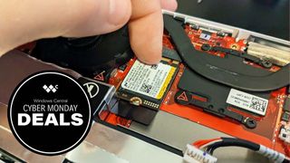 An image of an open ROG Ally and a finger removing the SSD.