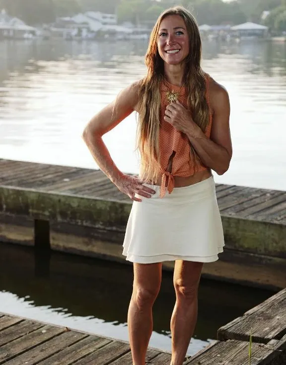 Liver Queen, Barbara Johnson, standing on boat dock