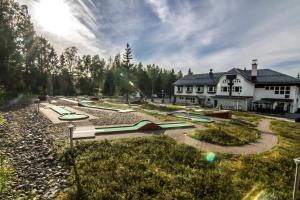 a building with a lot of skateboards in a park at Aateli Lakeside Chalets - former Vuokatti Suites in Vuokatti