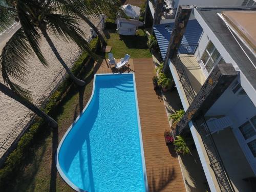 an overhead view of a blue water slide in a yard at Garden Villas in Grand-Baie