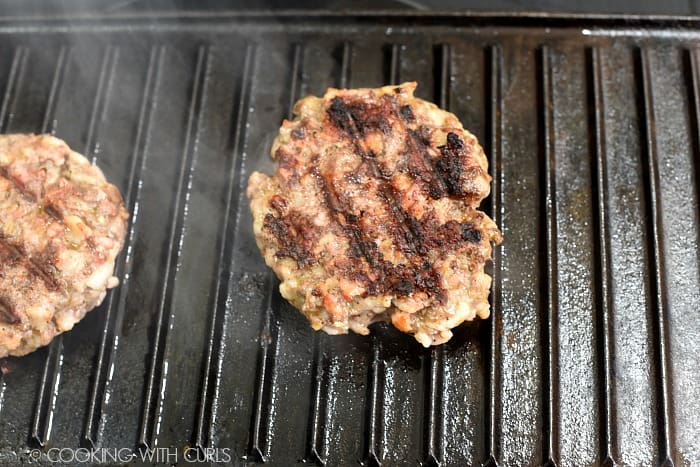 Grilled Double Bacon Burgers on a grill pan.