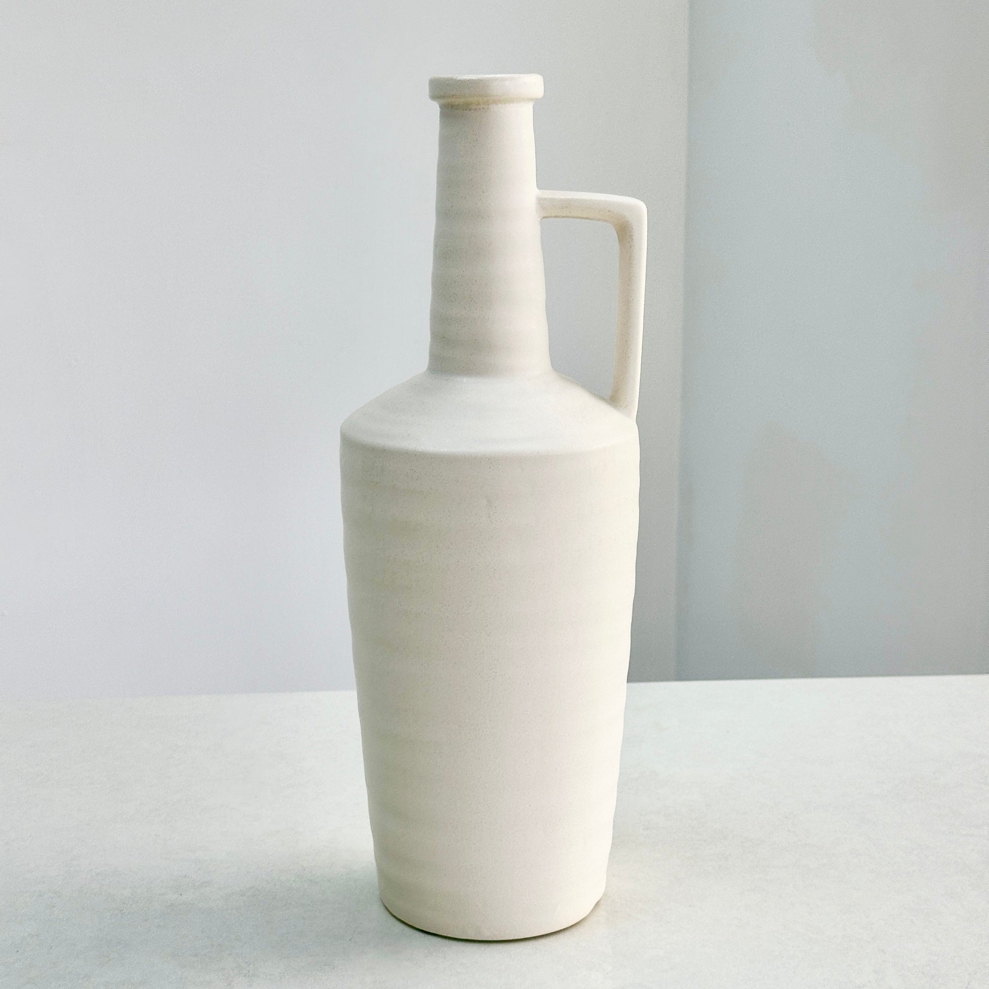 Ceramic White Tall Bottle Vase with Side Handle