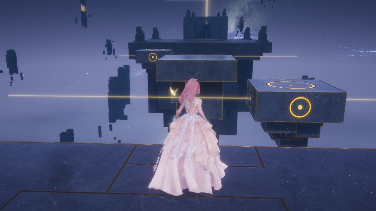 Nikki in a pink ballgown looking at an obstacle course