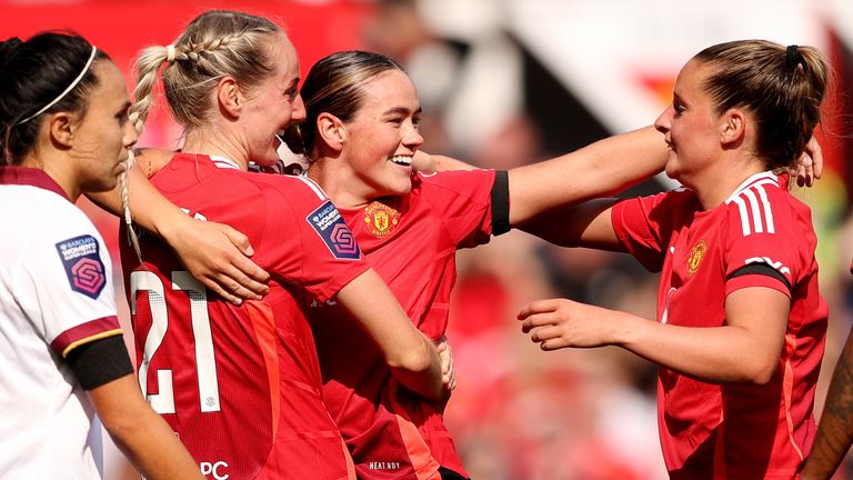 Grace Clinton is congratulated after scoring Manchester United's third goal against West Ham