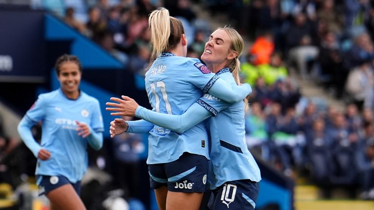 Lauren Hemp celebrates scoring Man City's opener with Jill Roord