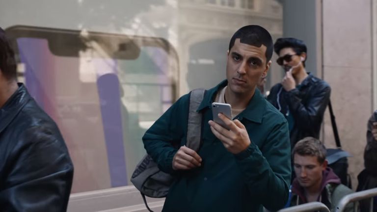 A man's hairline resembles the iPhone X's 'notch'. Pic: Samsung