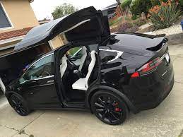 2017 tesla model x reader review | what car? Black With The White Interior Tesla Sports Car Tesla Suv Sports Cars Luxury