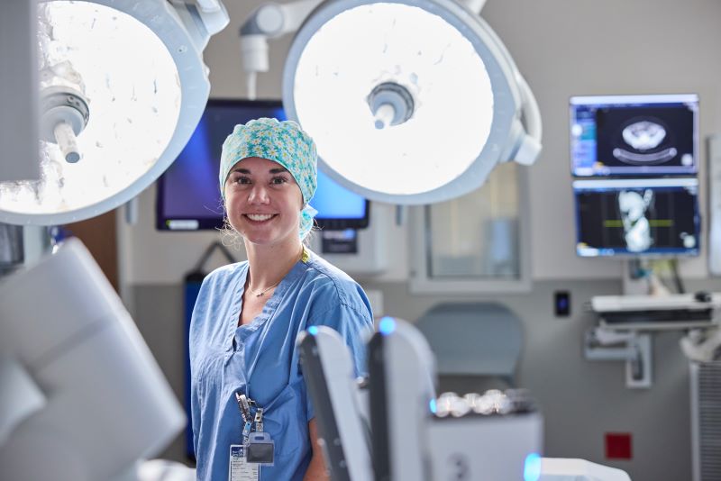 Nurse standing in operating room.