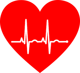Imagen de un corazón y un electrocardiograma de dos latidos normales