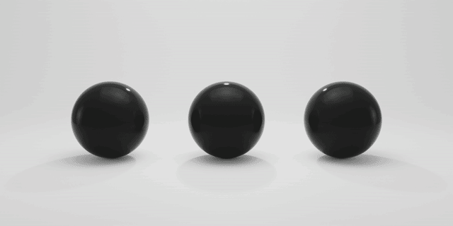 three spheres in a white environment, the left side is animated, the other two are tied to it using the curveAtTime driver function in Blender
