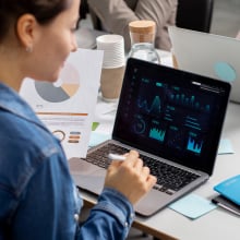 woman using laptop to view data