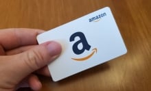 hand holding Amazon gift card