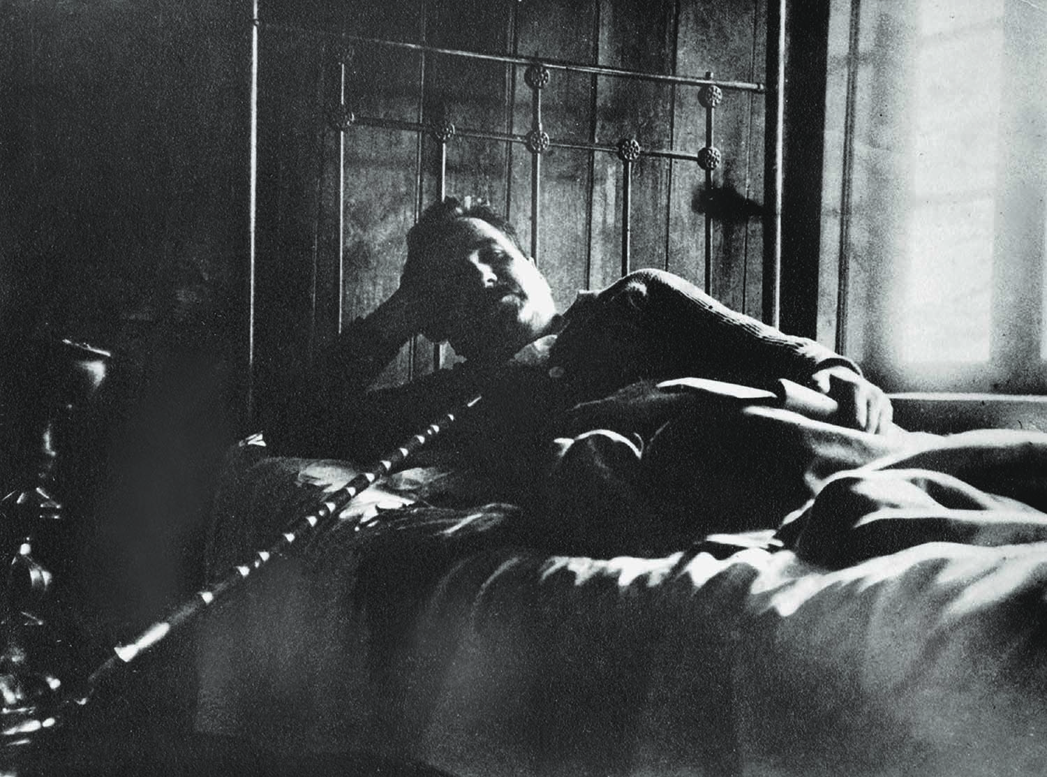 Allama Iqbal relaxing at his residence in Lahore, smoking his favourite hookah. Photo: The Allama Iqbal Collection.