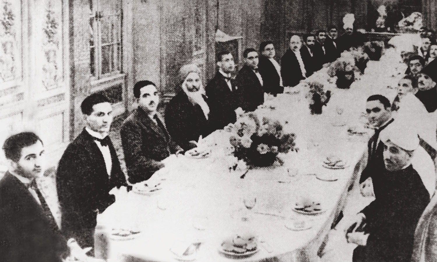 Allama Iqbal (centre; right in his characteristic headgear) sitting alongside Quaid-i-Azam Mohammad Ali Jinnah at the Round Table Conference in London (above). | Photo:
The Allama Iqbal Collection