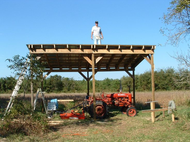 Harry and neighbor building the tractor shed in 2006 | Run 