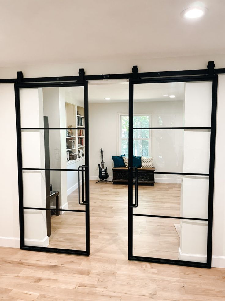 Glass Barn Doors Gave Our Office A Stunning Modern Look | Glass barn ...