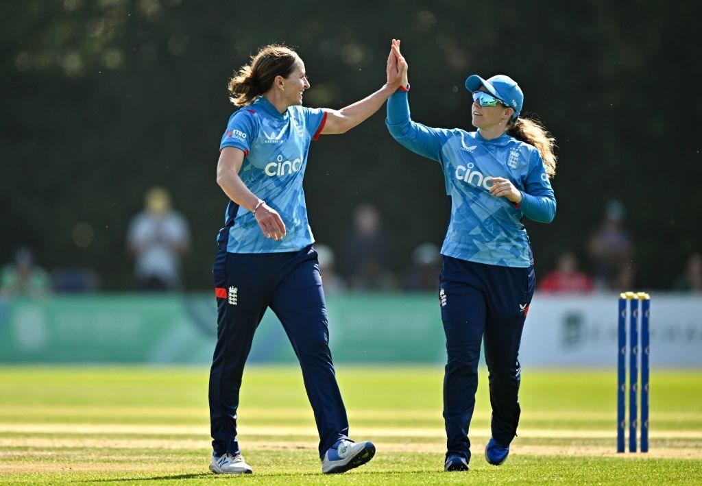 Kate Cross (left) and Tammy Beaumont celebrate a wicket against Ireland