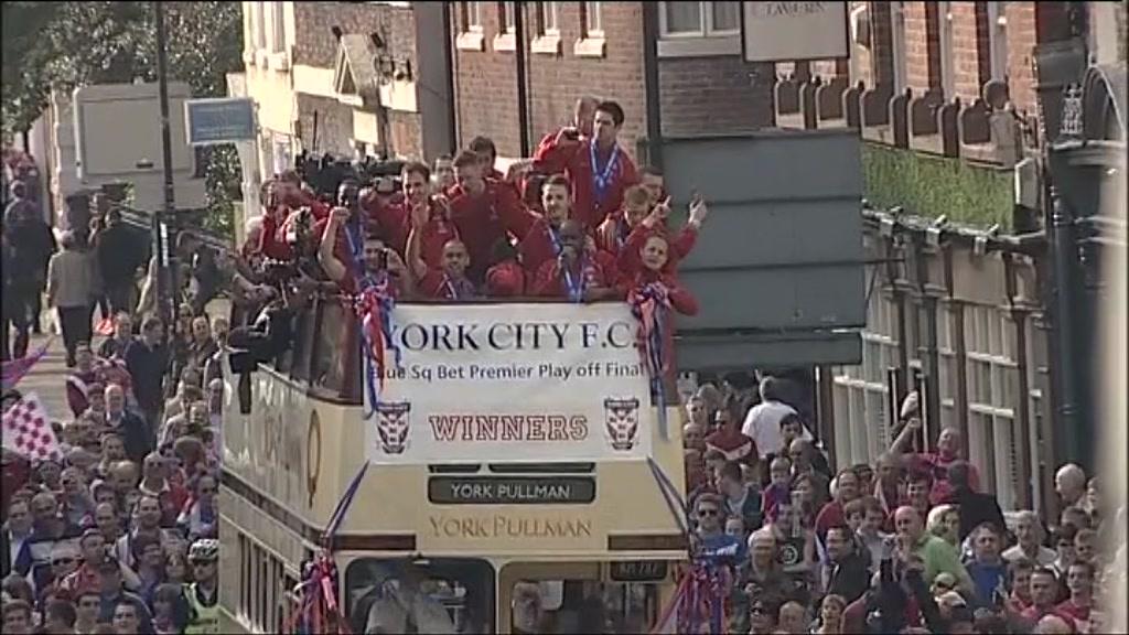 York City players on their open-top bus