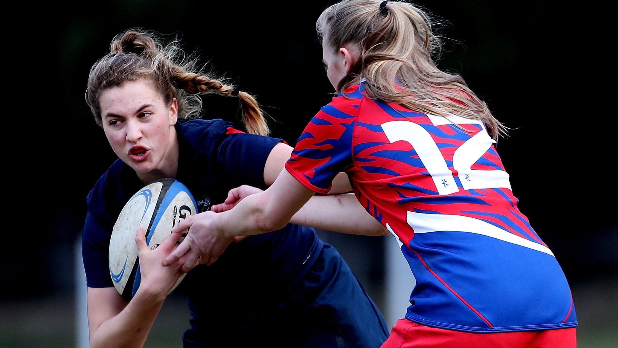 Girls playing rugby union