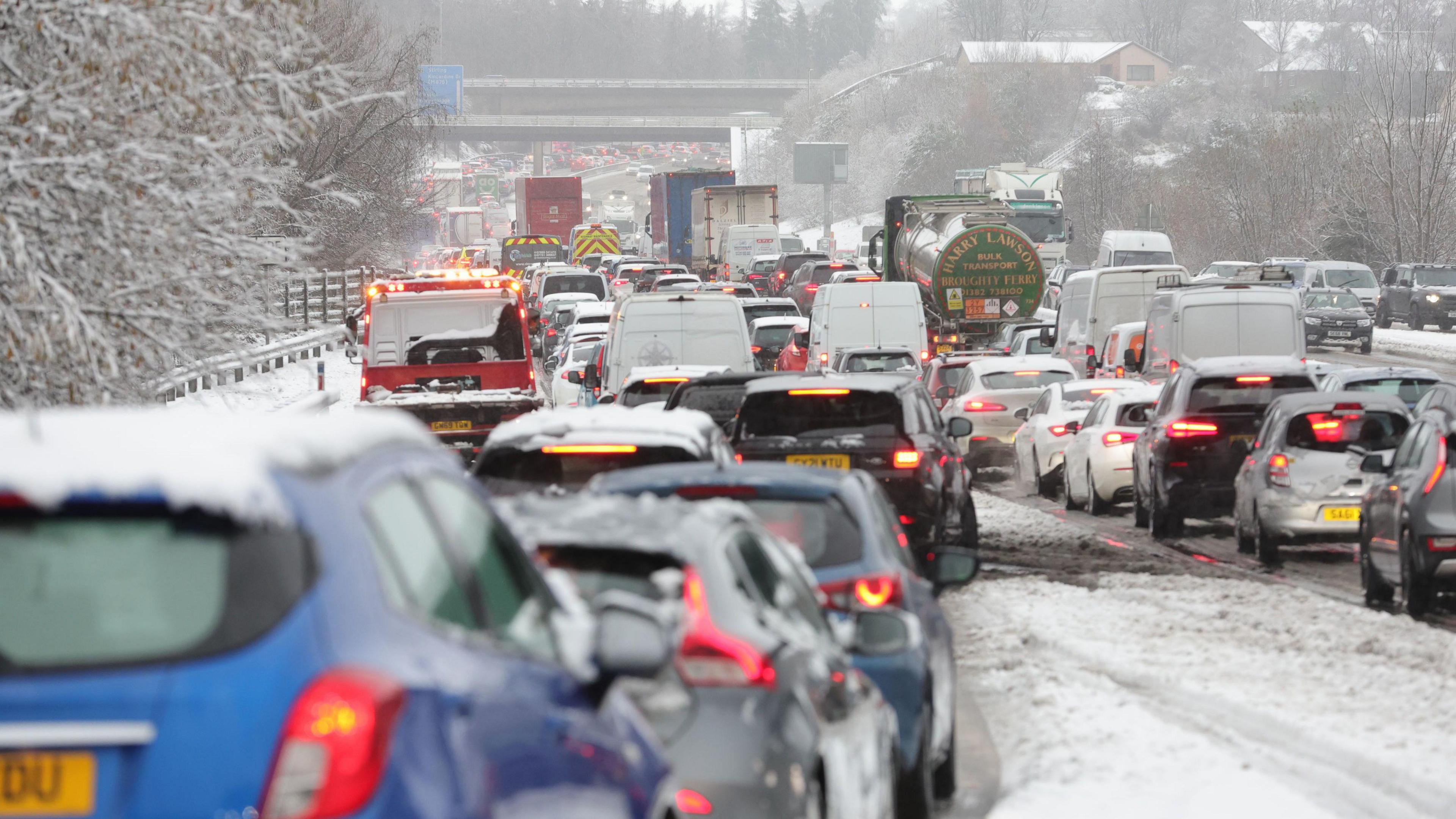 Traffic at a standstill in bad weather conditions on the M80 near Castlecary, North Lanarkshire, Scotland