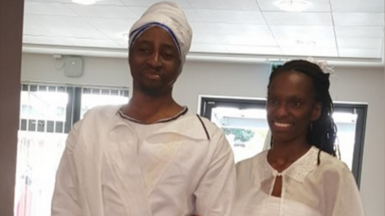 Tai and Naiyahmi Yasharahyalah on their wedding day wearing white clothes