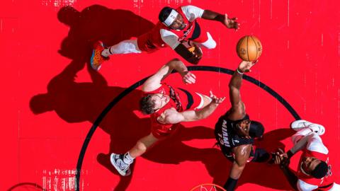 Bam Adebayo of the Miami Heat rebounds the ball during the game against the Toronto Raptors at the Scotiabank Arena in Toronto, Ontario, Canada.