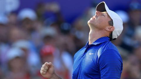 Rory McIlroy looks to the sky after winning the DP World Tour Championship and Race to Dubai