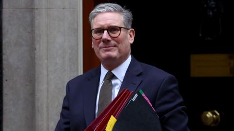 Keir Starmer leaving 10 Downing Street for Prime Minister's Questions