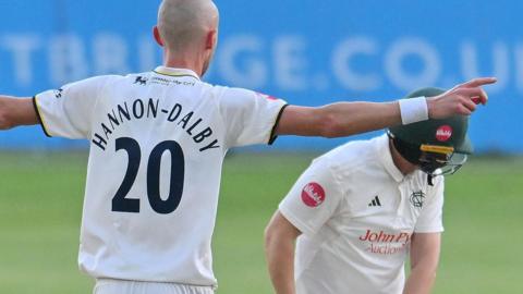 Oliver Hannon-Dalby celebrates taking wicket