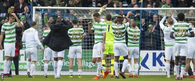 Celtic players celebrate with their fans