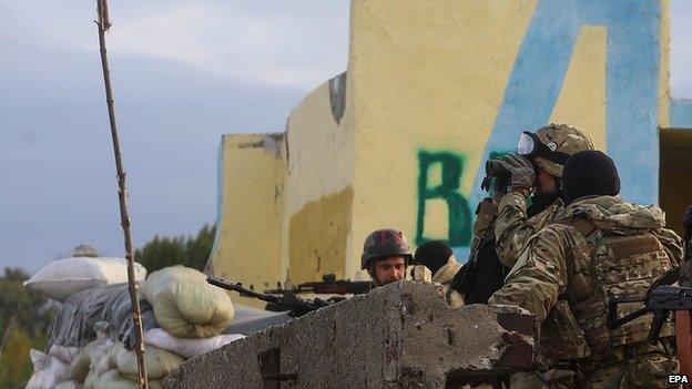 Ukrainian troops at checkpoint in the east