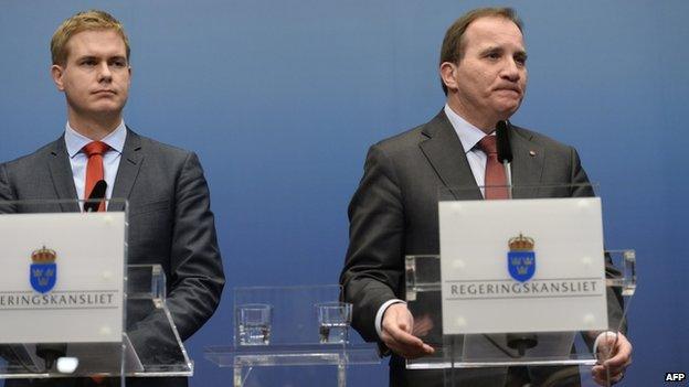 Sweden's Prime Minister Stefan Lofven (R) with Greens spokesman and Education Minister Gustav Fridolin