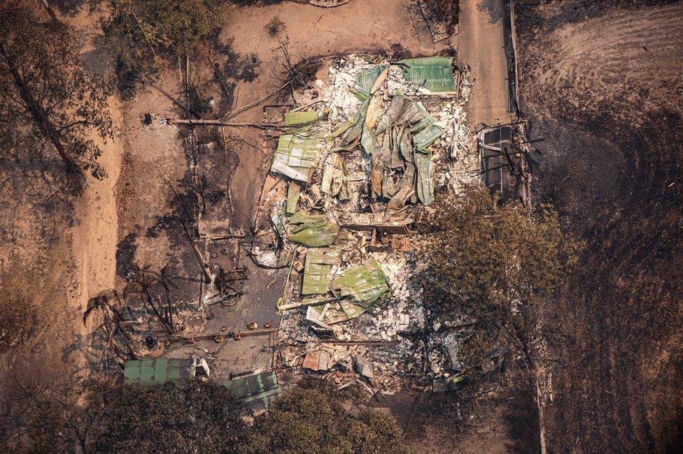 An aerial view of property damaged by bushfires