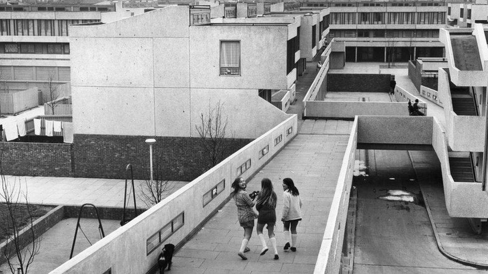 May 1972: Thamesmead housing project, a GLC venture. Pedestrians on the walkways that connect the flats, in Abbey Wood, South London