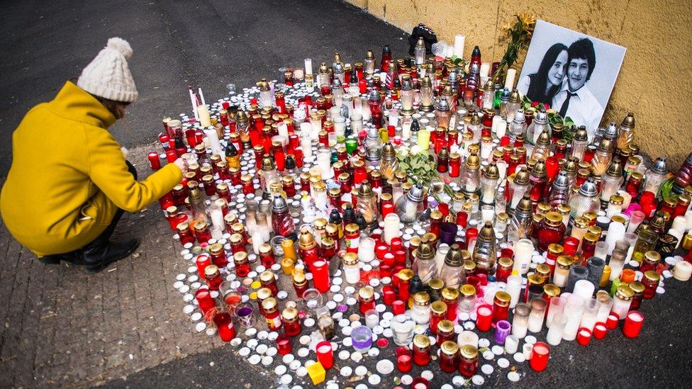 Candles commemorating slain investigative journalist Jan Kuciak