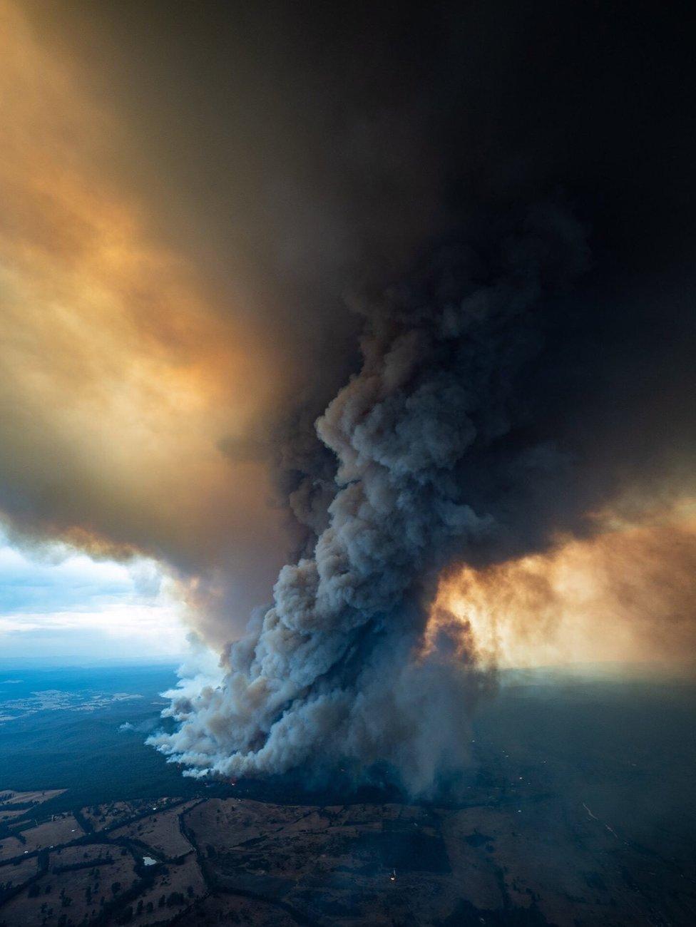 Smoke billows from a fire burning